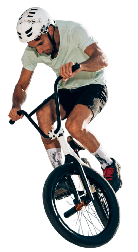 young-man-cycling-skatepark-low-angle-shot-Photoroom